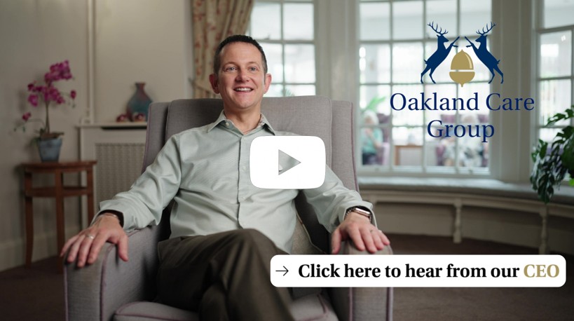 A video thumbnail featuring the CEO of Oakland Care Group, with a play button overlay and a prompt to click to hear from him.