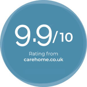 Circular blue badge graphic showing a 9.9 out of 10 rating from carehome.co.uk